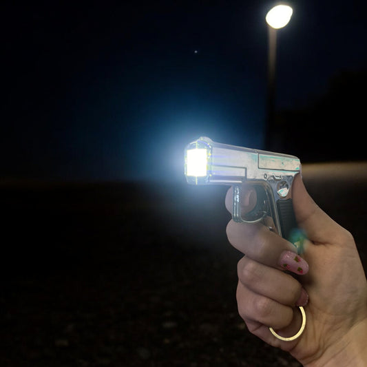 LLAVERO PISTOLA CON LUZ LASER