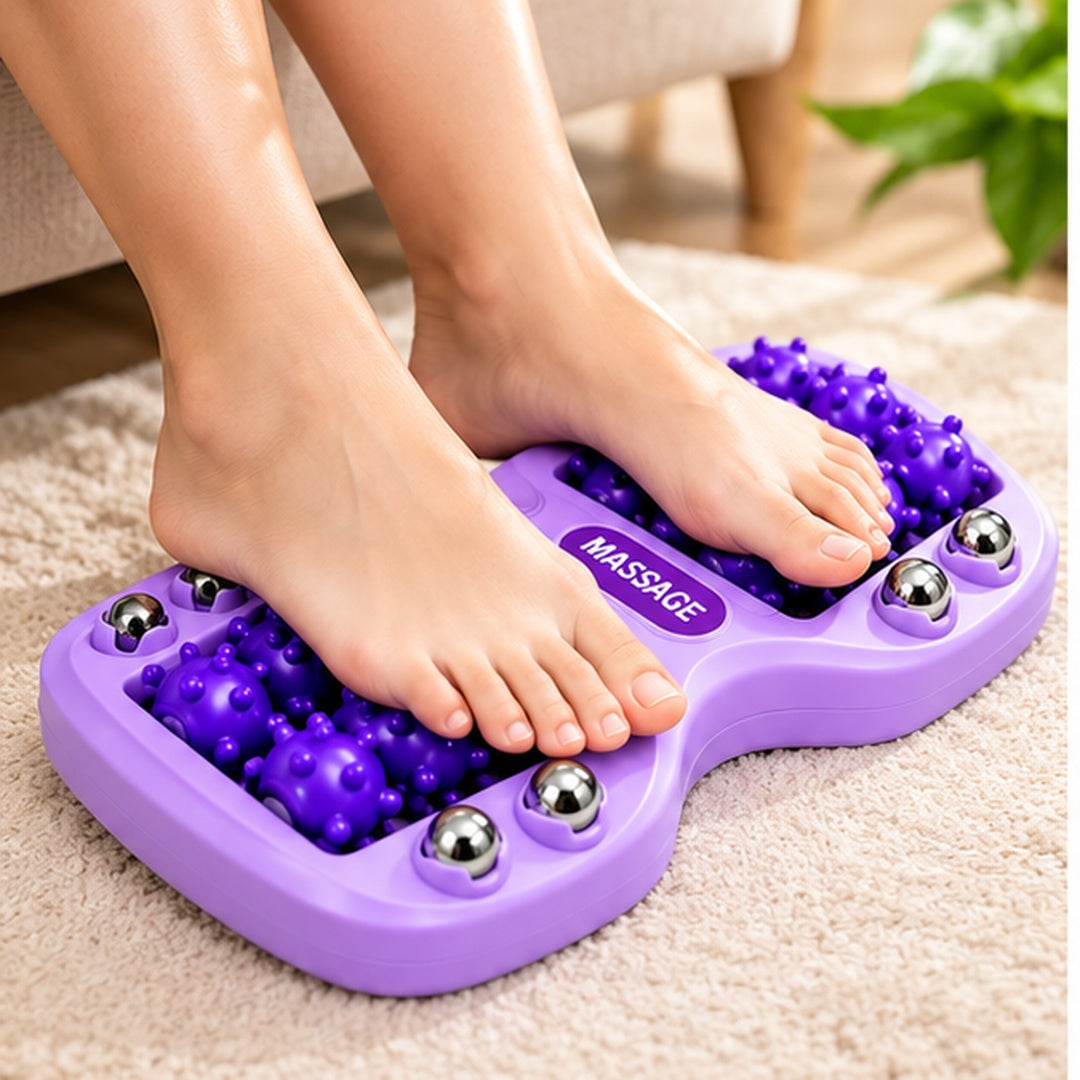 Masajeador de pies morado en uso