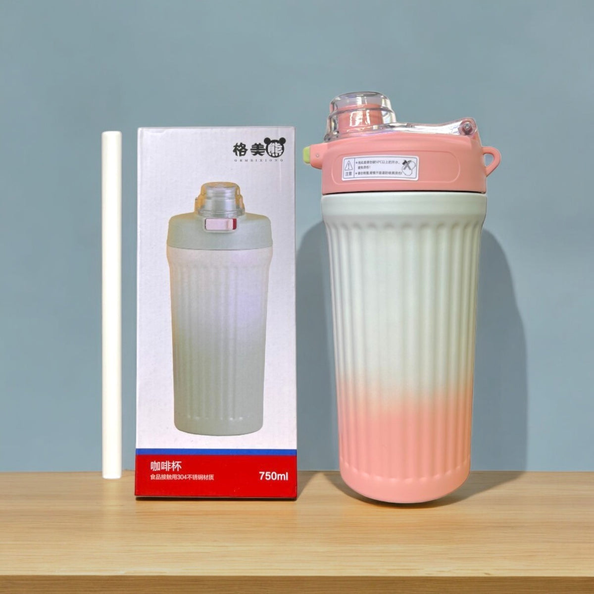 Termo térmico grande rosa y blanco de 750 ml con tapa abatible y pitillo
