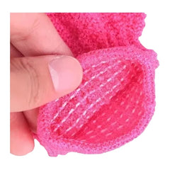 Detalle de la textura rugosa del guante exfoliante rosa JP185, vista de la palma.