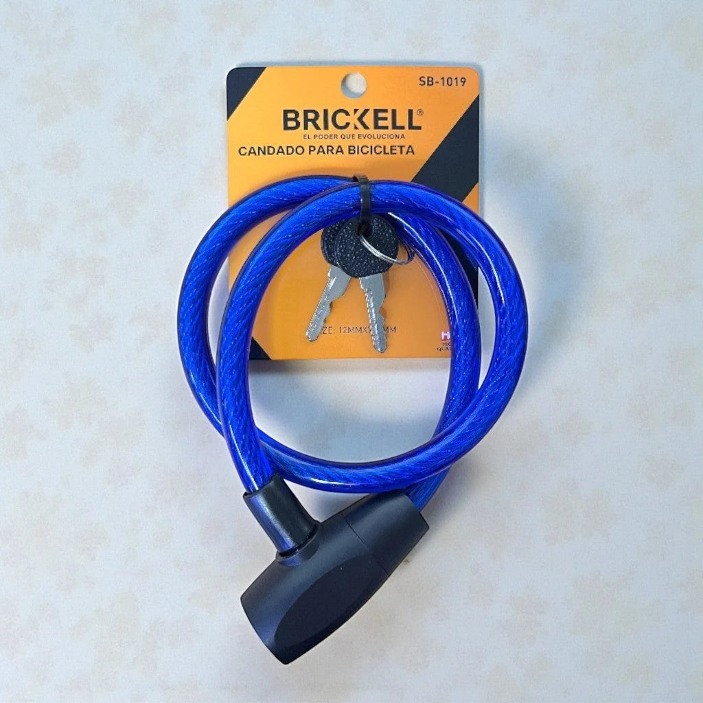 Candado de bicicleta con cable azul enrollado, cerradura de llave con dos llaves y empaque Brickell SB-1019.