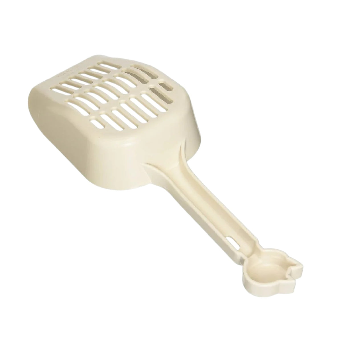 Pala perforada color beige para desechos de mascota