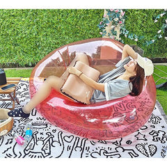 Sillón inflable rosado INTEX usado al aire libre