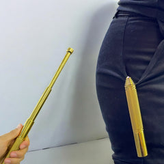 Bastón extensible dorado en formato largo y compacto